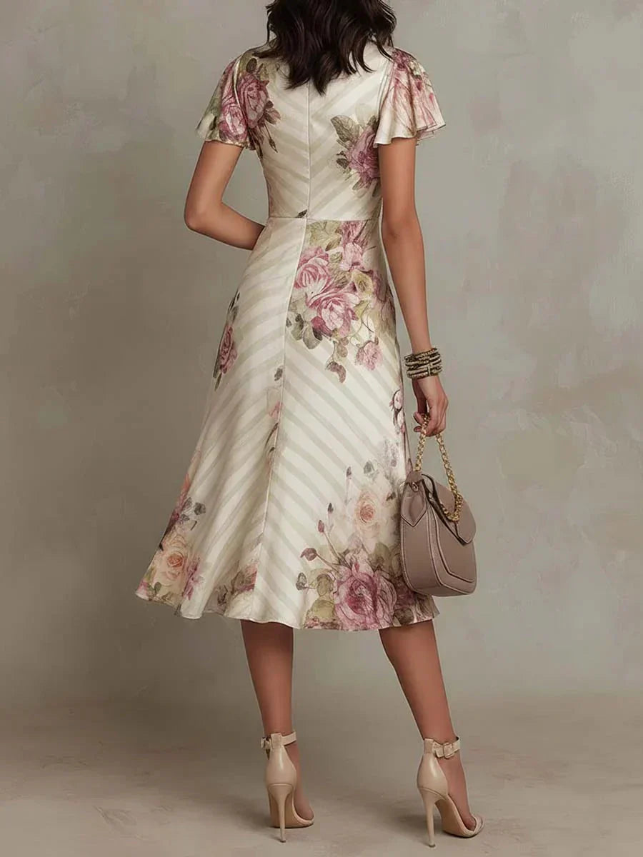 Alba | Robe midi cache-cœur froncée à imprimé floral élégant