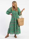 Flore | Robe midi à volants et col en V à imprimé fleuri