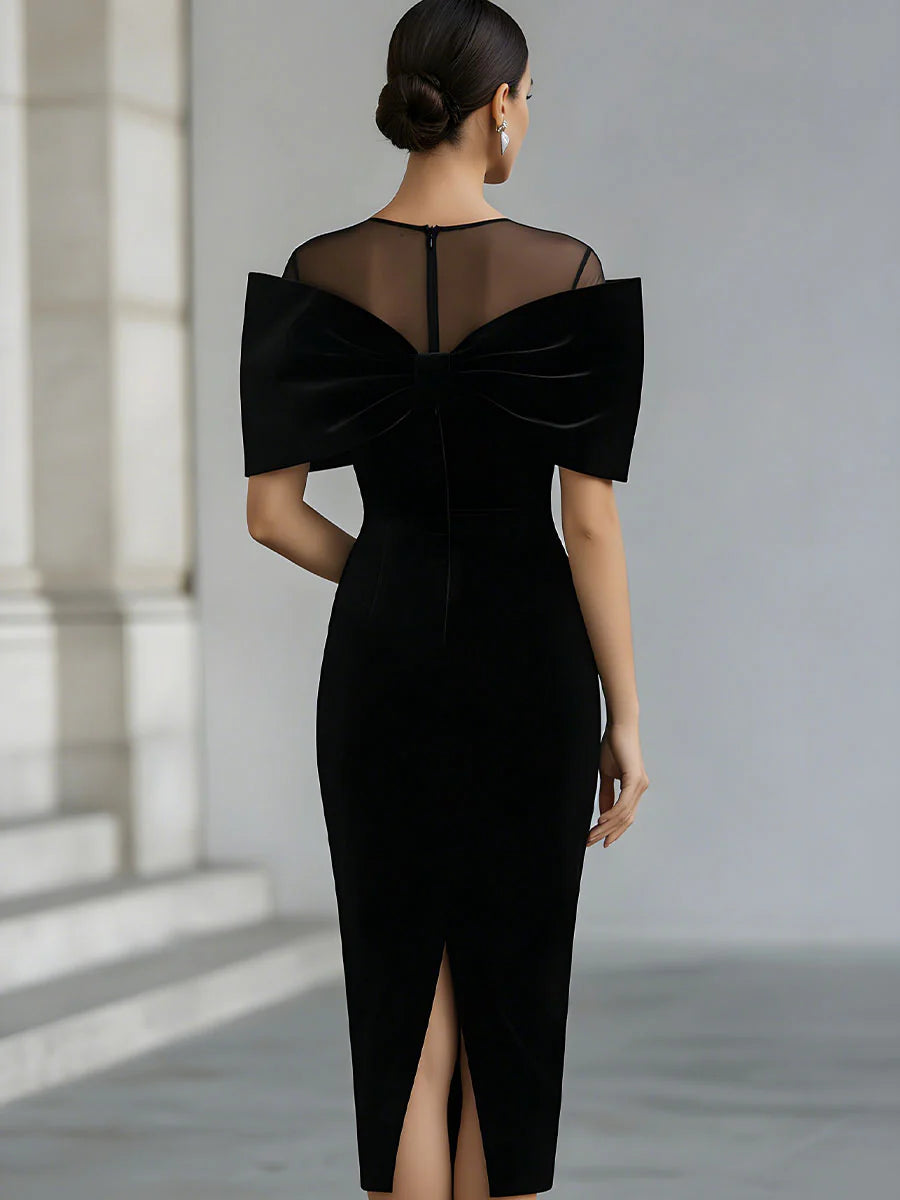 Régine | Robe Midi en Velours Noir, Nœud Spectaculaire